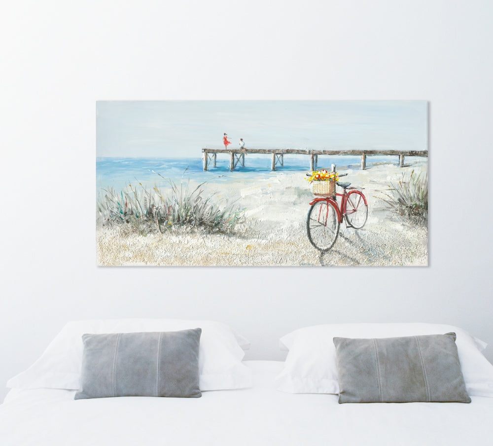 Rotes Fahrrad am Strand