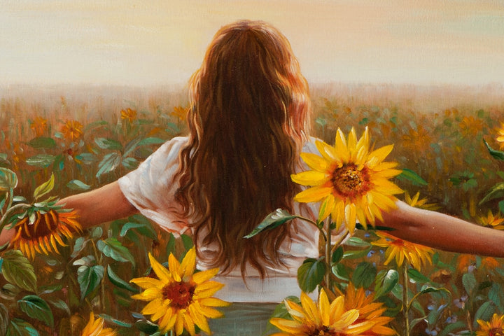 Frau im Sonnenblumenfeld