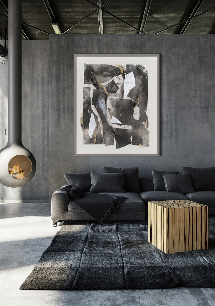 Modernes Wohnzimmer mit grauem Ecksofa und abstraktem Wandbild im Basquiat-Stil mit zwei Skelettfiguren in Schwarz, Weiß und Rot an weißer Wand.