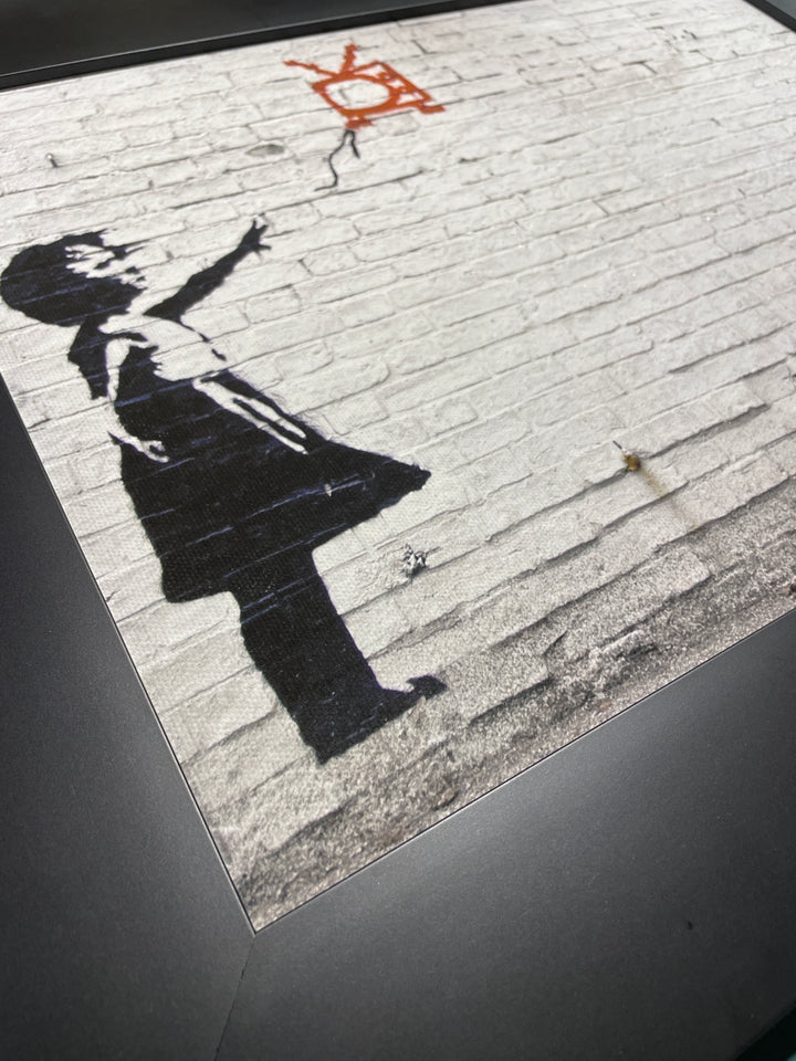 „Girl With TV Baloon“ | Banksy