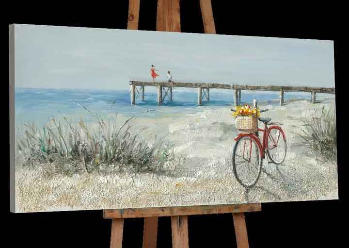 Rotes Fahrrad am Strand