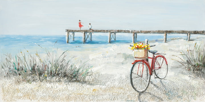 Rotes Fahrrad am Strand