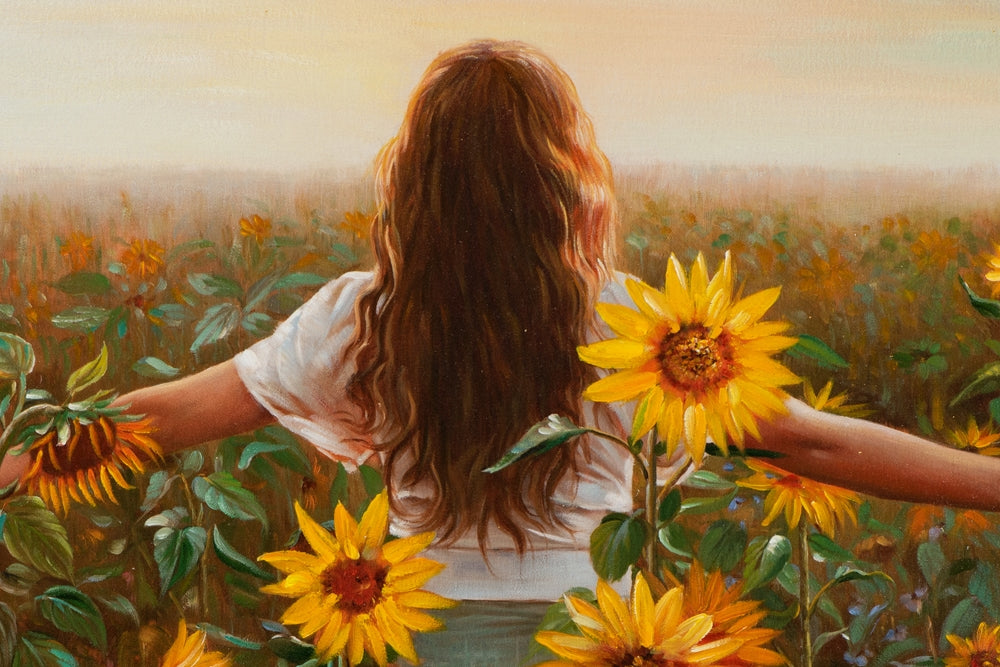 Frau im Sonnenblumenfeld